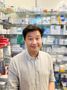 Image of Lun Shen Wong in his pharmacy